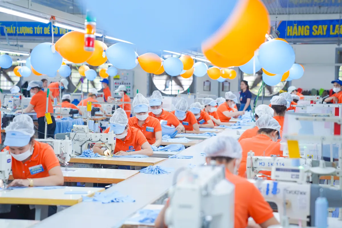 Xuất khẩu vững vàng trước thuế quan - Ảnh 2.