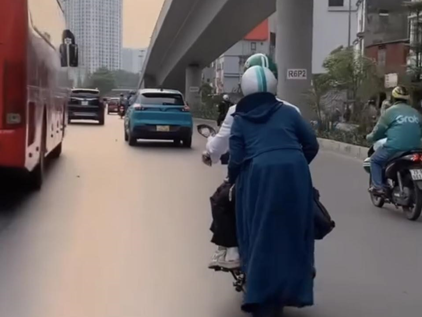 Chống nắng không đúng cách tiềm ẩn nguy cơ mất an toàn giao thông - Ảnh 1.