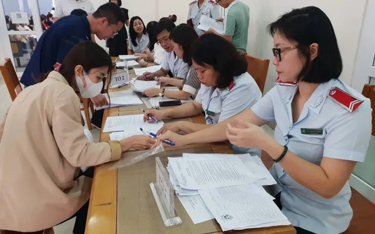 Từ 1/7, thay thế mức lương cơ sở bằng mức tham chiếu để đóng BHXH cho người lao động - Ảnh 1.